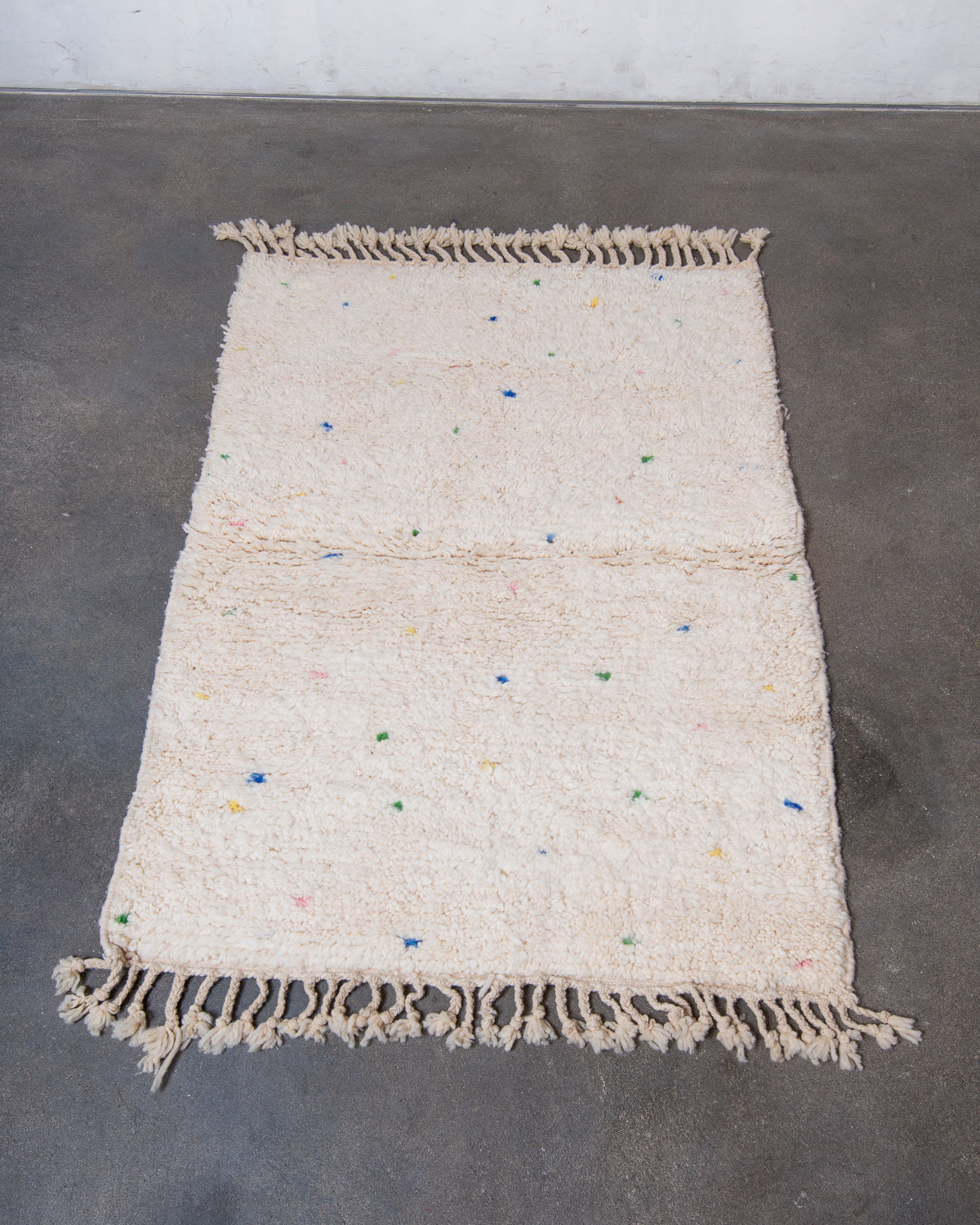 Modern, designer, handcrafted Berber rug from Morocco. Beniourain carpet with beautiful colours and patterns and fluffy wool texture.